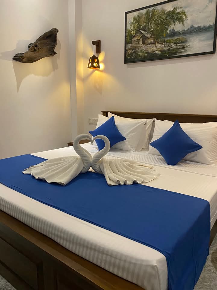 Towel Swans on Bed
