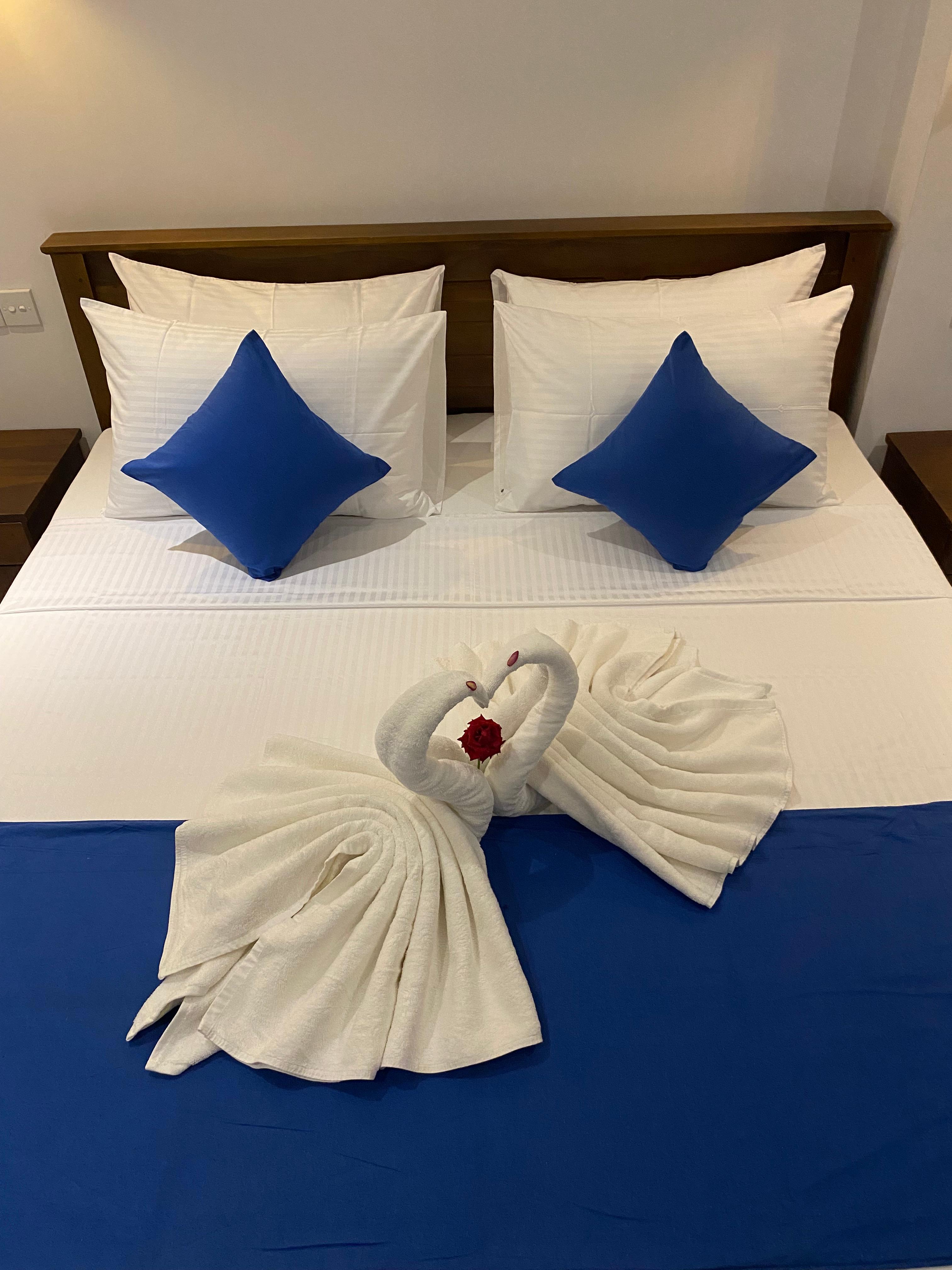 Towel Swans on Bed